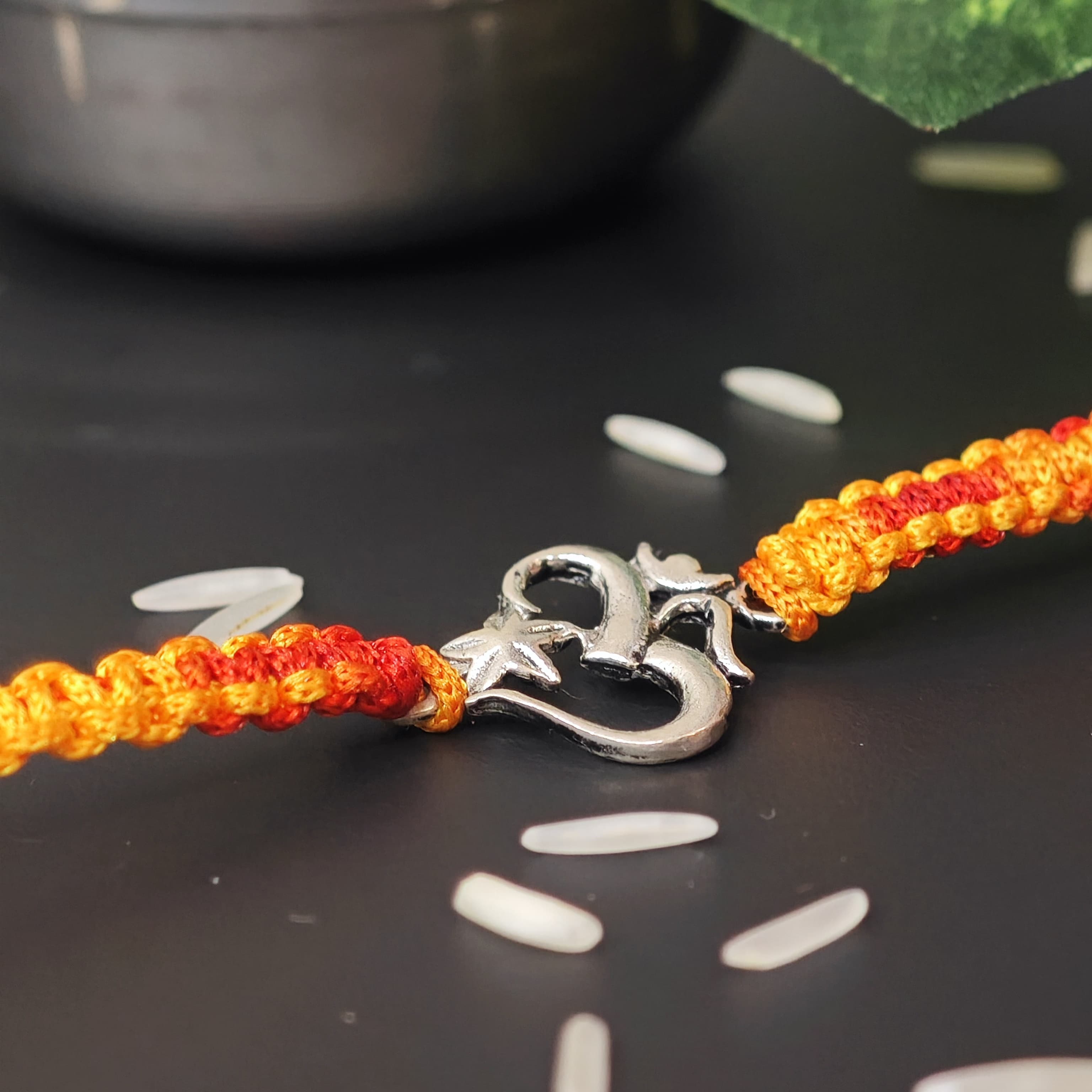 SILVER RAKHI OM