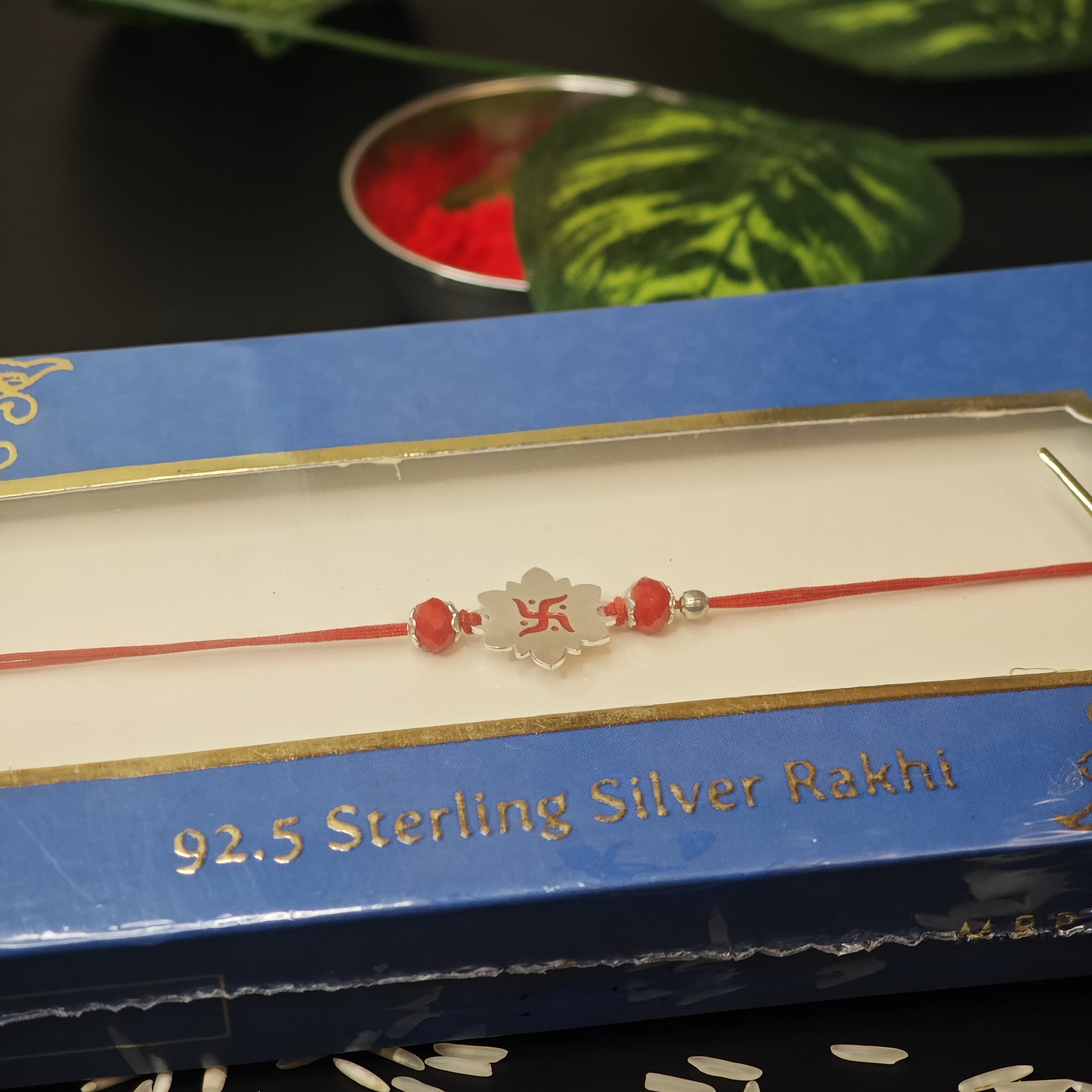 SILVER RAKHI SWASTIK