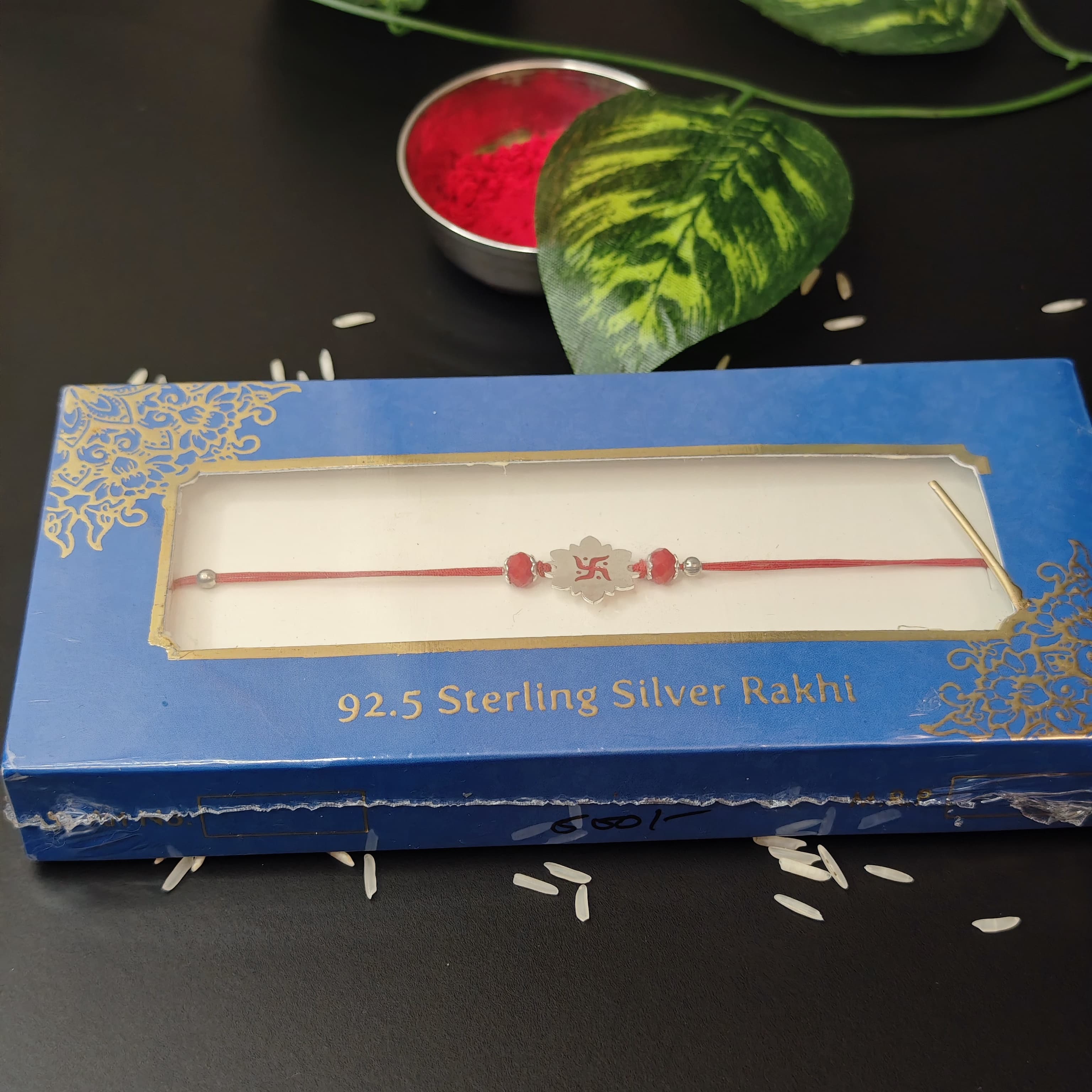 SILVER RAKHI SWASTIK