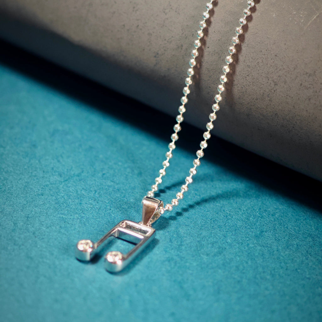 Necklace pendant music