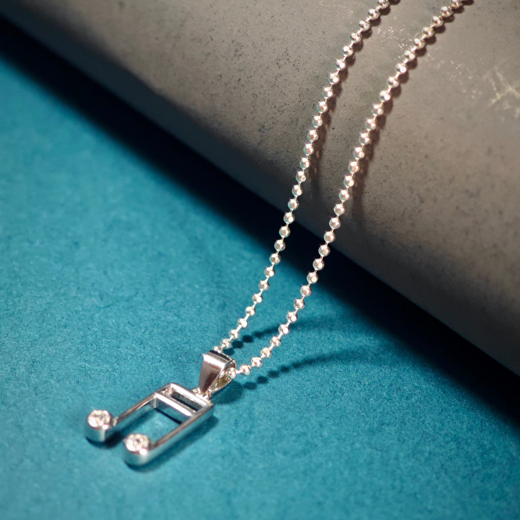 Necklace pendant music