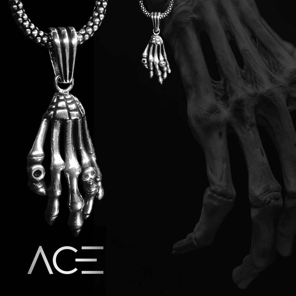 Skull hand pendant