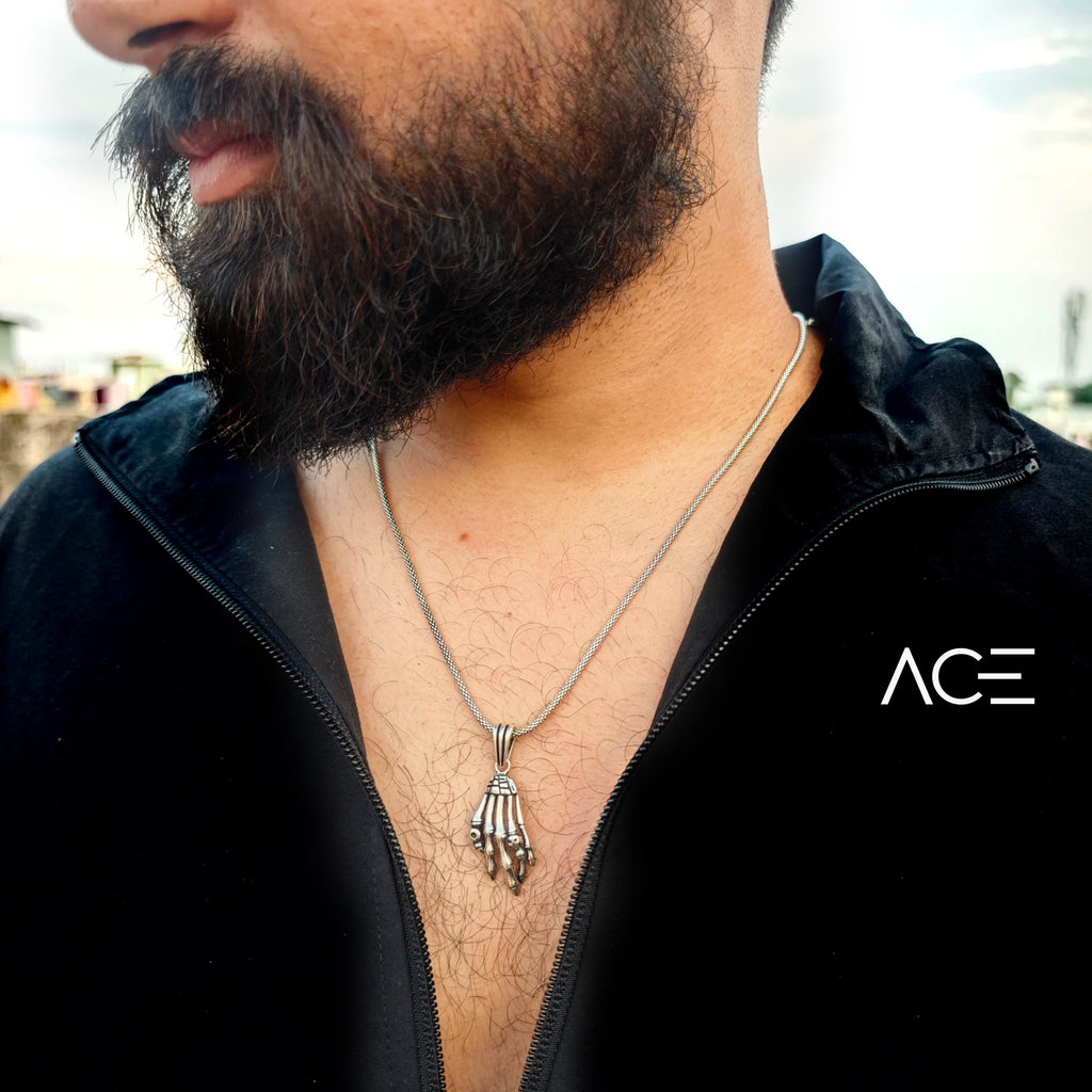 Skull hand pendant